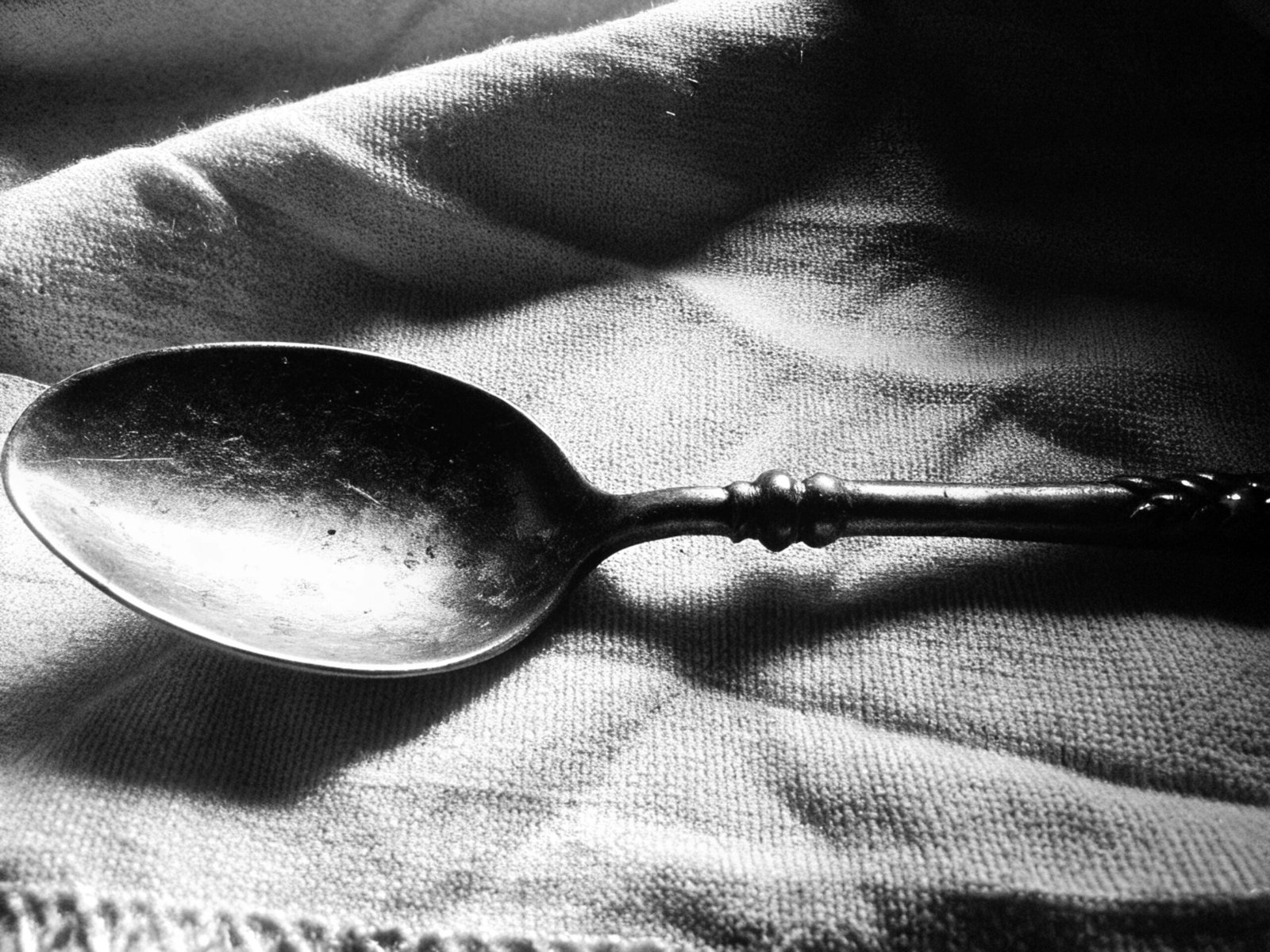 Tarnished Silver Spoon