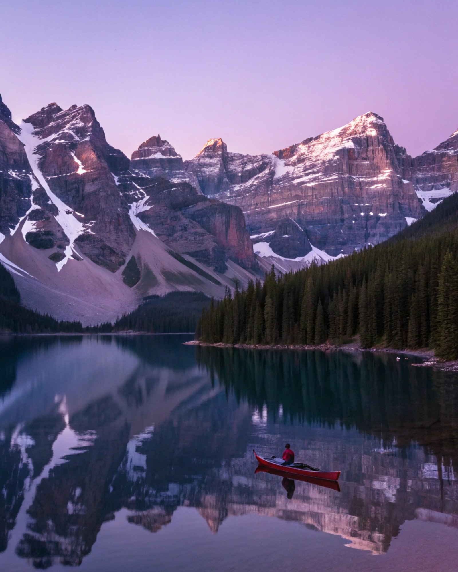 Alpine Lake with Canoe